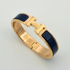 H BLUE BRACELET Luxury Jewelry With Gold Clasp For Gift, Blue Bangle With Polished Finish, Blue Polished Bracelet Jewelry, Blue Fine Jewelry Bangle For Gifts, Blue Polished Bracelet, Elegant Blue Cuff Bracelet For Gift, Timeless Blue Bracelet For Formal Occasions, Blue Polished Finish Bracelet, Blue Cuff Bracelet Bangle For Formal Occasions