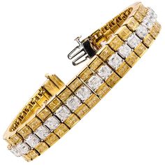 A very bold and elegant bracelet, showcasing one row of Asscher cut white diamonds weighing 15.70 carats total, channel-set between two rows of princess cut fancy yellow diamonds weighing 10.99 carats total. Finely made with an 18K yellow gold mounting. Perfect accessory to complement any outfit. Roman Malakov is a custom house, specializing in creating anything you can imagine. If you would like to receive a special quote on a custom piece please message or call us. Diamonds Bracelet, White Gold Bangle, Asscher Diamond, Yellow Diamonds, Asscher Cut Diamond, Gold Link Bracelet, Fancy Yellow Diamond, Antique Bracelets, Diamond Bangles Bracelet