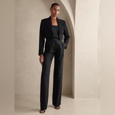 Wandering But Never Astray, The Lavish Heritage Explorer Pant Is Crafted For The Souls That Wish To Roam In Luxury With The Elevated Texture Of Italian Wool. Our Designers Added A Zip Fly, Making It Easier Than Ever To Seize The Day. Relaxed Fit: High Rise. Expertly Cut For A Loose Fit. Straight Leg. Extra Long - So You Can Wear Them With Heels. From Italy's Marzotto Mill: This Style Is Crafted Using 100% Virgin Wool From Italy's Marzotto Mill - One Of The Oldest Mills In Italy, Renowned For Cre Elegant High Waist Workwear Sets, Elegant High-waist Workwear Sets, Chic Black Wide Leg Suit, Chic Black Wide-leg Suit, Elegant Black Sets With Straight Pants, Black Fitted Wide-leg Pantsuit, Black Fitted Pantsuit With Wide-leg Pants, Elegant High Waist Formal Sets, Elegant High Waist Black Sets