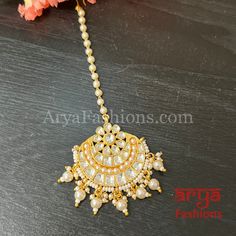 Bridal Rajwadi Kundan Mang Tika with Pearls Mang Tika: Approx. 5 Inches Hook feature to tie the mang tika to hair Made in Brass with golden finish and high quality Kundan stones Lightweight Jewelry Suitable for any occasion and traditional or Modern attire Ready to ship and available for local pickup from 23059. Please message us for more details Free shipping on orders above $75 within USA. Adjustable Kundan Tikka For Diwali, Adjustable Kundan Tikka With Latkans, Adjustable Kundan Tikka, Traditional Adjustable Tikka With Stone Work, Adjustable Kundan Bollywood Tikka, Adjustable Tikka For Festive Occasions, Traditional Adjustable Kundan Necklace With Stone Work, Adjustable Kundan Necklace With Tilla For Festivals, Adjustable Traditional Kundan Necklace With Stone Work