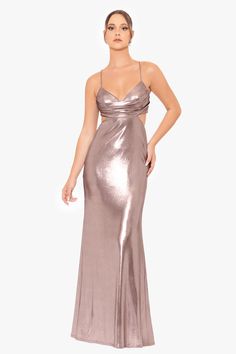 The "Livy" Metallic Backless Gown is a breathtaking ensemble that effortlessly combines modern allure with a touch of avant-garde design. The metallic fabric gives this gown a stunning sheen, catching and reflecting light for a glamorous effect. The backless feature adds a bold and sensual element, making it an ideal choice for those who want to make a statement at any special occasion. PRODUCT DETAILS: Material: Metallic Glitter Lining: Fully Lined Closure: Hidden Back Zipper Details: Off the S Glamorous Metallic Backless Dress, Elegant Metallic Floor-length Gown, Formal Metallic Floor-length Gown, Metallic Fitted Floor-length Gown, Metallic Floor-length Evening Gown, Backless Gown, Reflecting Light, Evening Dresses Plus Size, Sophisticated Dress