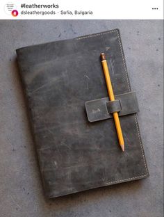 a notebook with a pencil on top of it next to an instagram post that reads, leather works