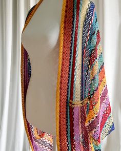 Meet your outfit's perfect match - the Wildflower Cocoon. This cardigan is lightweight, colorful, and can be worn in any season. Who knew practical could be so sexy? One size. Material: 100% nylon Care: Hand wash, lay flat to dry. Multicolor Open Knit Cardigan, Multicolor Cotton V-neck Kimono, Non-stretch Bohemian V-neck Cardigan, Cocoon Cardigan, Multicolor Floral Print V-neck Kimono, Perfect Match, Wild Flowers, Trim, Yellow