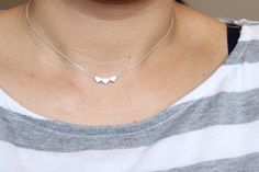 This heart necklace doesn't have initial on it. If you want the initial heart necklace, please follow the link to see itInitial heart necklace:https://www.etsy.com/listing/236533468/tiny-dainty-initial-heart-necklace?ref=shop_home_active_1&ga_search_query=heart%2BnecklaceYou can add more than one heart charm to the necklace. Please select the number of heart charm you want at the drop out menu. Also availalbe in bracelet and anklet. Please go to my shop to see the listings or if you have any que Dainty Heart Charm Necklace For Best Friend, Dainty Heart Charm Necklace For Best Friend Gift, Cute Jewelry For Best Friend Gift, Dainty Silver Heart Pendant Initial Necklace, Dainty Heart Pendant Necklace For Best Friend, Dainty Heart Pendant Charm Necklace For Best Friend, Heart Charm Jewelry For Bridesmaid Gift, Heart Shaped Charm Necklaces For Best Friend, Heart-shaped Charm Necklaces For Best Friend