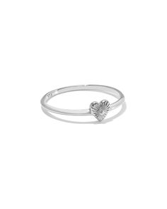 The dainty details of the Maia Heartburst Band Ring in Sterling Silver have stolen our hearts. An homage to the traditional jewelry technique of hand engraving, this ring features an etched design resembling a bursting heart. Crafted in long-lasting metal, you’ll love this ring season after season. Metal Sterling Silver Why Sterling Silver? Our Sterling Silver collection features elevated styles to wear time and time again. With a base of both pure silver and copper, Sterling Silver provides a p Dangle Rings Silver, Kendra Scott Ring Silver, Silver Rings Dainty, Sterling Silver Heirloom Heart Ring For Promise, Heirloom Sterling Silver Heart Ring For Promise, Heirloom Engraved Heart Ring For Promise, Heirloom Engraved Heart Promise Ring, Engraved Heart Promise Ring In Fine Jewelry Style, Engraved Heart Ring For Promise - Fine Jewelry