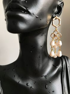 "🤗I'm very excited to present you a new pair of earrings that could make any woman satisfied and happy ! The earrings are composed of pearls and gold filled brass accessories. I used 6 pieces of pearls on each earring, that makes 12 pieces on a pair, the pearls doesnt not make any heaviness or pressure on the earlobe. The earrings are light and do not cause any kind of allergy 🙏 The pearls have a diameter of 8 mm , and have shiny white color . ❗ Feel free to contact me for item questions. Each item is individually wrapped in kraft jewelry gift box. If you want to add a gift note to the package, please leave a note in the \"add note to YouNiqueJewelscrafts\" message box at the checkout.🙏 🛫Please check your address details during the worder for excluding any unwanted problems ! Dont forg Metal Earrings With Pearl Chain For Gift, Metal Earrings With Pearl Chain As Gift, Metal Pearl Chain Earrings As Gift, Pearl Chandelier Drop Earrings With Pearl Chain, Pearl Beaded Drop Earrings For Pierced Ears, Pearl Chandelier Earrings With Pearl Chain As Gift, Gold Pearl Jewelry With Dangling Beads, Handmade Pearl Chandelier Earrings, Pearl Chandelier Earrings For Pierced Ears