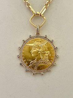 Beautiful reproduction vintage coin pendant, French Madagascar coin in a bezel with cubic zirconia stones. The bale attached to the coin is also encrusted with CZ stones. The coin is 22k gold plated and elegantly hangs from a multi link gold plated brass chain and a rope design spring lock clasp. The spring lock closure not only makes it easy to open and close the necklace for those with difficulty but adds to the creativity of the jewelry piece. Please see photograph of how to open the clasp. W Gold Coin Necklace, Gold Coin, Rope Design, Coin Necklace, Keep Jewelry, Coin Pendant, Gold Chain Necklace, Gold Coins, Brass Chain