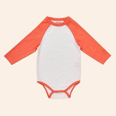 We love this baseball inspired onesie. Featuring bold bright colors and sweet sport-inspired graphics, it pairs perfectly with the City pants for an easy spring outfit. We’ve sweetened the deal by adding a bit of stretch to our organic cotton jersey so it’s oh so comfortable. 95% Organic Cotton, 5% Spandex Relaxed Fit Long Sleeve Cotton Onesie, Cotton Onesie For Spring Loungewear, Casual Unisex Onesie With Letter Print, Casual Onesie With Letter Print For Loungewear, Cotton Stretch Bodysuit For Playtime, White Cotton Sports Bodysuit, Spring Cotton Bodysuit With Relaxed Fit, Spring Onesie For Playtime With Stretch, Playful Stretch Onesie For Spring