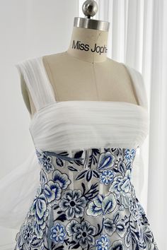 This blue and white porcelain embroidery floral corset mini dress is made of high quality material with removable straps for extra convenience. Its unique design features intricate floral embroidery and a corset-style bodice, making it perfect for a dressy occasion. Bust and Skirt with full lining. 100% Polyester 100% Recycled polyester lining Concealed zip at centre back Imported Blue And White Formal Dress, Porcelain Embroidery, Science Wedding, Blue Corset, Floral Corset, Corset Mini Dress, Blue And White Porcelain, Embroidery Floral, White Embroidery