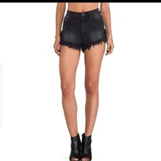 Unif Shorts. Black. Distressed Trendy Black Short Bottoms, Edgy High Waist Stretch Shorts, Edgy High-waist Stretch Shorts, Edgy Stretch Shorts, Black Grunge Bottoms For Night Out, Edgy Stretch Short Bottoms, Trendy Cutoff Bottoms For Night Out, Trendy Black Shorts, High Rise Bottoms With Built-in Shorts For Night Out