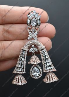 Statement premium quality Naira rhinestone embellished CZ half jhumki earrings with Baguette stones. Graceful design to wear in any occasions. Comfortable to wear. Length: 3 1/2" Push-Back closure with Omega clip for extra support. Finish: Victorian & Rose Gold. Availability: In-Stock *Color may vary slightly due to light condition & photography. Jewelry Care: Keep away from moisture. Allow perfumes and lotion to dry before wearing. Store in jewelry pouch. Clean only with soft lint free cloth. Diamond Earrings Indian, Photography Jewelry, White Victorian, Earrings Indian, Jhumki Earrings, Earrings Rose Gold, Pakistani Jewelry, Indian Earrings, Gold Diamond Earrings