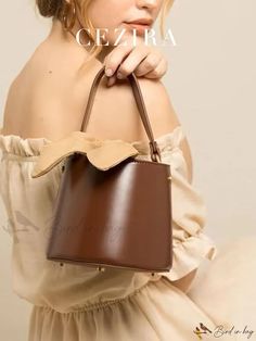 Bird in Bag - Womens Knotted Bow Tote Bag with Top Handle Fashion Accessory Brown Handheld Shoulder Bag With Dust Bag, Brown Satchel Bucket Bag For Spring, Spring Brown Satchel Bucket Bag, Brown Bucket Bag For Errands, Brown Shoulder Bag As Spring Gift, Chic Brown Shoulder Bag For Gift, Chic Brown Shoulder Bag As Gift, Brown Large Capacity Bucket Bag As Gift, Brown Shoulder Bag Gift For Spring