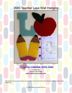 the back side of a cross stitch pattern with an apple and letter i on it