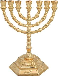 a golden menorah with candles on it