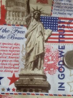 the statue of liberty has been made into a fabric with american symbols and words on it