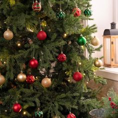 a christmas tree with ornaments hanging from it