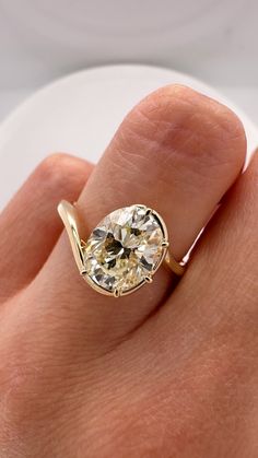 DETAILS: - natural 2 carat champagne color oval diamond - approx. O-P color, VS2 clarity - set in 14k yellow gold with 5 claw prongs and a half Victorian swirl setting - can be sized to any size complimentary! DM or email us at oriannejewelry@gmail.com with your order number to request your needed size. Champagne Diamond Engagement Ring, Champagne Diamonds Engagement, Anna Sheffield, Oval Diamond Ring, Claw Prong, Champagne Diamond, Champagne Color, 2 Carat, Oval Diamond