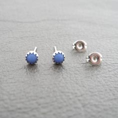 A simple pair of Periwinkle Blue Czech Glass Earrings!These earrings are handmade with Sterling Silver and have a 4mm Czech Glass cabochonMix and match with my other stud earringsEarrings include sterling silver butterfly backs.This listing is for one pair of earringsYour earrings will ship in a gift box. Minimalist Blue Everyday Earrings, Dainty Blue Hypoallergenic Earrings, Dainty Hypoallergenic Blue Earrings, Blue Minimalist Hypoallergenic Earrings, Minimalist Hypoallergenic Blue Earrings, Dainty Blue Round Earrings, Hypoallergenic Sterling Silver Blue Earrings, Nickel-free Blue Earrings, Tiny Blue Minimalist Earrings