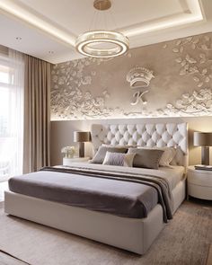 a large white bed sitting in a bedroom next to two lamps on either side of it