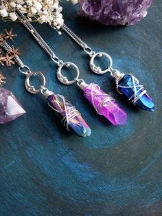 "Witchy moon quartz crystal necklace with your choice of quartz color - AB Peacock, AB Pink, AB Blue. Necklace comes on stainless steel chain suitable for those with allergies. Clasp is high quality 304 stainless steel and measures 8x13mm. ➳ Moon charm is 20mm ➳ Chain length is 18\" - total length is approximately 22\" ➳ All components are lead and nickel free ➳ Please note the size, color and shape of crystal will vary slightly due to natural inconsistencies ̩̩͙✩*̩̩͙*˚＊ ̩̩͙✩*̩̩͙*˚＊ ̩̩͙✩*̩̩͙*˚＊ Crystal Car Charms, Moon Quartz, Boho Moon, Quartz Color, Quartz Colors, Witchy Jewelry, Necklace Layering, Hippie Necklace, Necklace Crystal