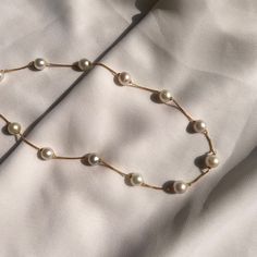 "Dainty Pearl Necklace, 18K Gold Choker Necklace, White South Sea Pearl Chain Necklace, Spaced Pearl Necklace, Valentine's Gift Product Details :- Gross Weight : 17.50 Gram Stone Weight : 70.70 CTS Pearl Size : 9 MM  Pearl Color : White  No. of Pearl : 13 \"Elevate your style with our Dainty Pearl 18K Choker Necklace. Delicately layered, this South Sea Spaced Bead Necklace in 18K gold is a timeless and elegant accessory, perfect for gifting on Valentine's Day.\"" White Round Necklace With Gold Chain, White Necklace With Gold Chain, Classic White Beaded Chain Necklace, White Necklaces With Gold Chain For Formal Occasions, Formal White Necklaces With Gold Chain, White Gold Chain Necklace For Formal Occasions, Gift Yellow Gold Pearl Necklace With Chain, Yellow Gold Pearl Necklace Chain As Gift, Classic Gold Pearl Necklace With Chain