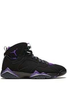 the nike air jordan 7 retro is in black and purple