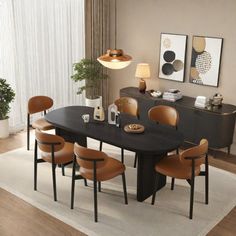 a dining room table with chairs and an area rug