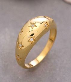 (eBay) Find many great new & used options and get the best deals for 14K Solid Gold Star Dome Ring, Starburst Ring, Star Signet Ring at the best online prices at eBay! Free shipping for many products! Starburst Ring, Silver Signet Ring, Dome Ring, Gold Ring Stack, Domed Ring, Gold Star, Wide Bands, Silver Stars, Gold Stars