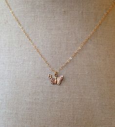 "This dainty butterfly necklace is the sweetest little gift for a girl of any age. It's a playful yet classic piece you can wear alone or layer with other necklaces. The charm and chain are 14kt gold filled. The charm itself is approx. 11 x 6mm. Lengths available: 16\", 18\", 20\"" Dainty Butterfly Necklace, Gold Mobile, Dainty Jewelry Necklace, Gold Butterfly Necklace, Dainty Butterfly, Butterfly Necklace Gold, Necklace Butterfly, Butterfly Butterfly, Accesories Jewelry