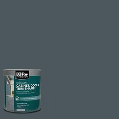 a can of behr paint in grey with the words behr next to it