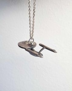 This is my fan art version of the Starship Enterprise from the one and only beloved Star Trek. <3 This spaceship is made my hand from scratch in recycled 925 sterling silver. It's matte finish and had an oxidation surface to make the look just right. :) This pendant necklace is solid silver and a respectable size as well, therefor has a nice weight to it. The measurements are 43 mm lenght, 20 mm width. I hope you love it! :) Starship Enterprise, Spaceship, Star Trek, Sweden, Necklace Etsy, Jewelry Necklace Pendant, Silver Necklace, Jewelry Necklaces, 925 Sterling Silver