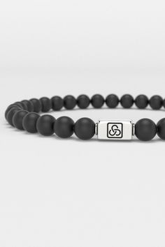 Discover the Essential Bracelet from Seekers, where minimalism meets the ethos of self-expression and refinement. This 6mm bracelet embodies the Seekers' philosophy of understated elegance, catering to the discerning individual who values both simplicity and depth in design. Its sleek onyx beads make a subtle yet impactful statement, perfect for the modern seeker who navigates life with quiet confidence and a keen sense of style. This piece isn’t just an accessory; it’s a testament to the beauty Minimalist Jewelry With 8mm Beads, Minimalist Hypoallergenic Beaded Round Bracelets, Minimalist Hypoallergenic Round Beaded Bracelets, Minimalist Hypoallergenic Beaded Bracelet, Minimalist Silver Beaded Bracelets, Minimalist Everyday Bracelet With 8mm Beads, Minimalist Everyday Bracelets With 8mm Beads, Minimalist Silver Wristband For Everyday, Everyday Silver Minimalist Wristband