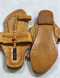 Men Sandals - Natural Brown Leather Kolhapuri Chappals, Jesus Shoes for Men, Buffalo shoes, Men Flats, Ethnic Indian Slip OnsIf you don't find your size you can check this design for available sizeshttps://www.etsy.com/in-en/listing/1015217153/men-slip-ons-mens-kolhapuri-chappals-manUpper Material: Leather strapSole Material - Vegetable tanned leather soleSole Thickness- The thickness of the sole is 4-6 mm.Interesting Facts about kolhapuri chappals- Not a single iron nail is used in the entire m Bohemian Toe Ring Sandals With Round Toe For Festivals, Traditional Closed Toe Toe Ring Sandals For Festivals, Brown Round Toe Ring Sandals For Festivals, Brown Toe Ring Sandals For Festival, Brown Toe Ring Sandals With Round Toe For Festivals, Traditional Sandals With Leather Footbed And Round Toe, Traditional Closed Toe Sandals With Leather Lining, Traditional Single Toe Strap Sandals For Festivals, Traditional Leather Lined Sandals For Summer