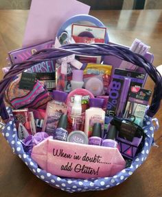 a purple basket filled with lots of different items