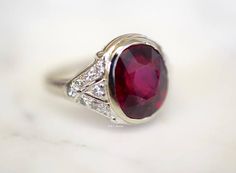 Vintage Platinum Ruby And Diamond Ring Platinum Rings, Traditional Engagement, Ruby And Diamond Ring, Hand Rings, Traditional Engagement Rings, Diamond Halo Ring, Right Hand Rings, Vintage Inspired Wedding, Halo Diamond Ring