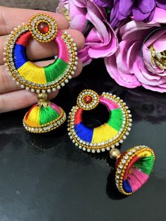 Designer Silk thread Handmade Multi Colours Beautiful Earrings (Jhumka)  for Eid , Navratri, Weddings, Special Occasions!!   Earrings  Sizes: Length 7cm (long)  and 4cm width approx. Other designs available please check my other listings!! Thanks for looking...If you have any questions please do not hesitate to get in touch! Traditional Multicolor Chandelier Earrings For Diwali, Traditional Multicolor Diwali Earrings, Handmade Multicolor Festive Jhumkas, Bohemian Multicolor Festive Jhumkas, Multicolor Intricate Earrings For Navratri, Jhumka Earrings, Silk Thread, Chandelier Earrings, Boho Earrings