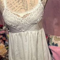 Very Cute Looks Brand New Vacation Cotton Tank Top With Lace Trim, Chic Cotton Camisole With Lace Top, Cotton Lace Trim Tank Top For Vacation, Cotton Camisole With Lace Trim For Day Out, Feminine Cotton Tank Top For Vacation, Cotton Lace Trim Camisole For Vacation, Victoria's Secret Lace Tops For Spring, Feminine Cotton Camisole For Vacation, Feminine Cotton Camisole For Beach