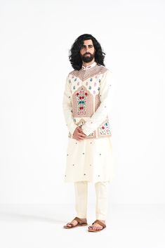 Ivory floral hand embroidered nehru jacket with intricate details on Linen Satin. Paired with Ivory slim fit Pant Pajama. Color of the actual garment may vary due to lighting conditions during the shoot.

Size Chart For Men





	
	
					Men's Size Chart
		

		
		
						
				Size Chart For Men
				Custom Size Measurement Guide
			
			
				
				
				Custom Size Measurement Guide
1. Take your measurements at ease…don’t hold your breath!
2. Be a little generous with the measurements. It’s always ea Bridal Shower Cocktails, Nehru Jacket, Nehru Jackets, Lehenga Saree, Kurta Set, Slim Fit Pants, Intricate Details, Workout Pants, Card Sizes