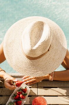 This summer, freshen up your outdoor look with a delightfully woven straw hat, fit with an on-trend flat brim, and topped off with a velvet trim for a hint of sophistication. It's the perfect accessory to bring a fun and fashionable flair to your beach days, pool parties, and picnics. So go ahead, rock the Piña Colada Hat and get ready to make summer memories! Check out when Brittnie paired this gorgeous hat with the Cancun Cabana Dress HERE. MMT8042 Luxury Summer Beach Cowboy Hat, Luxury Summer Party Sun Hat, Summer Party Felt Hat, Beach Sand And Hat, Fancy Hats Classy Beach, Luxury Chic Toquilla Straw Hat, Fancy Hats Beach, Luxury Fitted Mini Hat For Beach, Beach Day Accessories