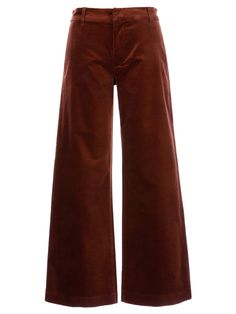 Women's Retro Velvet Pants KUT Meg Velvet Trousers Unleash your inner 70's fashionista in our Meg Wide Leg Velveteen Trouser. These high-rise, wide-legged trousers come in a choice of 'Black' or 'Brick' and hug your curves in all the right places! With a rise of 10 1/2" and inseam of 27 1/2" plus belt loops, they're cute, comfy and stylishly unique. Get ready to make a statement! Shop more from Kut from the Kloth here. Details Available in sizes: 0-12 Available in colors: Black and Brick High-ri Black Brick, Velvet Trousers, Stuff And Thangs, Boutique Homes, Cute Comfy, Velvet Pants, Trouser Style, Chic Fashion, Hug You