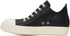 Low-top abrasion-resistant grained calfskin sneakers in black. · Cap toe · Lace-up closure · Eyelets at inner side · Logo-embossed padded calfskin footbed · Buffed calfskin lining · Treaded thermoplastic rubber sole Supplier color: Black/Milk/Milk Black Calf Leather Sneakers With Vulcanized Sole, Black Sneakers With Vulcanized Sole In Calf Leather, High-top Sneakers With Leather Sole For Sports, Black Leather Sneakers, Lace Sneakers, Black Milk, Black Cap, Low Sneakers, Rick Owens