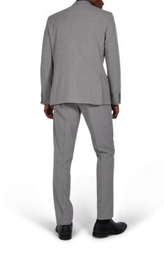 Sleek pinstripes distinguish a suit jacket and pants tailored in a trim fit for refined styling at any occasion. Jacket has notched lapels; four-button cuffs; chest pocket; flap pockets; back vent Lined 69% polyester, 29% rayon, 2% spandex Dry clean Imported Pinstripe Blazer With Welt Pockets For Business Casual, Pinstripe Double Breasted Suit With Notch Lapel For Work, Striped Double Breasted Suit With Notch Lapel For Office, Pinstripe Double Breasted Suit For Business Casual, Pinstripe Double Breasted Business Casual Suit, Striped Tuxedo Suit For Business, Pinstripe Blazer With Suit Collar For Business Casual, Formal Pinstripe Double Breasted Suit With Notch Lapel, Tailored Striped Double Breasted Suit For Business Casual