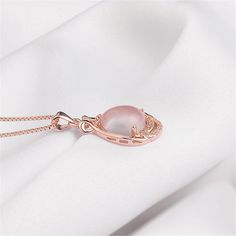 Finish off looks with a bit of glitz by donning this necklace designed to shine with a luxe 18-karat rose gold plating. Chain: 18'' L Pendant: 0.39'' W x 0.51'' L Lobster claw clasp 18k rose gold-plated copper / cubic zirconia / rose quartz Teardrop Pendant, To Shine, 18k Rose Gold, Necklace Designs, Lobster Claw, Rose Gold Plates, Rose Quartz, Cubic Zirconia, Gold Bracelet