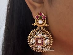 Discover the exquisite beauty of our Leela Ethnic Indian Earrings, a stunning blend of tradition and elegance. Handcrafted with meticulous attention to detail, these temple earrings are a testament to the rich heritage of Indian jewelry. Adorned with intricate designs inspired by temple architecture, these earrings exude timeless charm and grace. Crafted with high-quality materials and finished in radiant golden tones, these traditional earrings are perfect for adding a touch of Indian sophistic Traditional Earrings Indian Jewelry, Temple Earrings, Jewelry Traditional, Temple Jewelry, Temple Architecture, Types Of Earrings, Earrings Indian, South Indian Jewelry, Indian Necklace