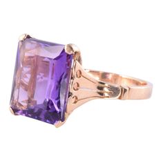 This is part of Chairish’s Fine Jewelry assortment.  Vintage retro approximately 7.50 carats amethyst ring, circa 1940. This 18 karat retro square cut amethyst ring is size 9.5.  Exact dimensions for this item are unknown.  Please reference the measurements noted in the description above for the best approximate dimensions. Please reach out to the seller under "Ask the Seller" for specific questions regarding the measurements.  *Resizing available for additional charge. Square Cut, Amethyst Ring, Retro Vintage, 50 %, Ring Size, Amethyst, Fine Jewelry, Product Description, Good Things