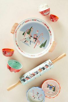 an assortment of christmas themed dishes and utensils