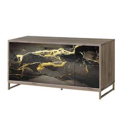 a black and gold cabinet with marbled doors on the bottom, one door open