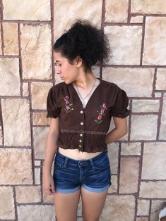 "Vintage treasure Lovely mexican top made in the 80's. Machine-embroidered flowers. Fits size Small Measurements taken flat: Armpit to armpit 19\" Bottom hem width 15\" stretches to 18\" Shoulder to Bottom hem 16 1/2\"" Vintage Brown Tops For Summer, Vintage Brown Summer Tops, Vintage Brown Summer Top, Vintage V-neck Top With Floral Embroidery, Brown Vintage Summer Tops, Fitted Cotton Embroidered Top With Puff Sleeves, Brown Vintage Blouse For Spring, Fitted Puff Sleeve Top With Floral Embroidery, Fitted Embroidered Top With Puff Sleeves