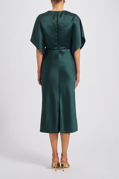 Fluid satin dolman sleeve bias midi dress. Shown in Hunter. Silk Bias Cut Dress For Workwear, Silk Bias Cut Midi Dress For Work, Silk Satin Evening Dress Midi Length, Silk Sheath Midi Dress For Formal Occasions, Green Midi Dress With Draped Sleeves, Satin Silk Midi Dress For Evening, Bias Cut Satin Midi Evening Dress, Formal Green Silk Midi Dress, Satin Bias Cut Midi Evening Dress