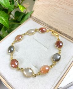 Moonstone Bracelet - Moonstone Jewelry - Multi Color Moonstone - Moonstone Garden Gold Moonstone Round Bracelets, Spiritual Gold Bracelets With Moonstone, Elegant Moonstone Healing Bracelet, Elegant Moonstone Crystal Bracelet For Gift, Elegant Moon Phase Bracelet As A Gift, Elegant Moon Phase Bracelet As Gift, Elegant Moon Phase Bracelets, Elegant Moon Phase Bracelet For Gift, Gold Moonstone Gemstone Bracelets